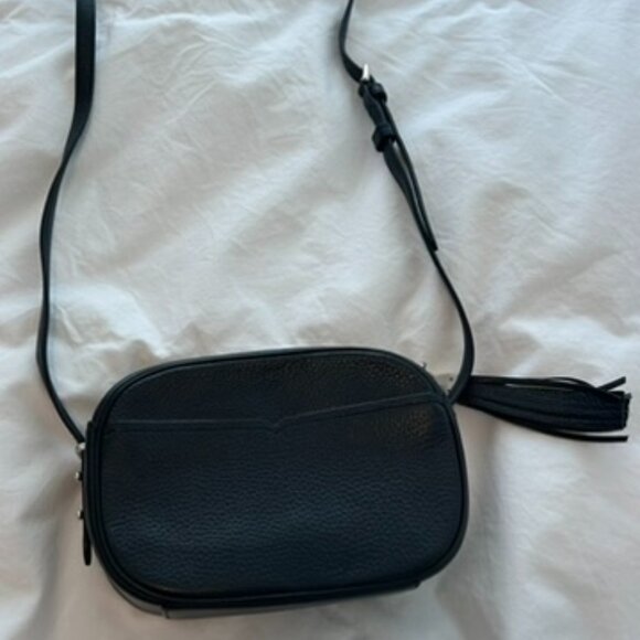 Small black leather Kate Spade cross-body bag with zipper tassel. - Picture 3 of 10